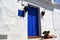 Blue door in Frigiliana, Spanish white village Andalusia