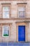 Blue door in old house in Scotland