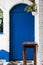 Blue door on white greek house