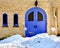 Blue Doors on Brick Church Building in Winter