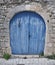 Blue double wing door with bell