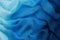 Blue draped silk scarf. Silk waves background