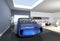 Blue electric car park into modern garage