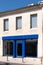 Blue empty shop facade showcase store exterior street in France Europe