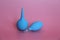 Blue enema with a soft tip. Blue nasal aspirator with glass tip