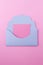 Blue envelope-letter on a pink background.