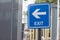 Blue Exit Sign, Metal Exit Sign, Parking Exit in Condo. Symbol. copy space. selective focus