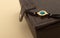 Blue eye golden bracelet on leather jewelry box