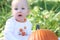 Blue Eyed Baby Boy with a Pumpkin