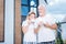 Blue-eyed woman leaning on shoulder of her handsome husband in the morning