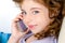 Blue eyes child girl talking mobile phone