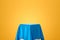 Blue fabric on podium shelf or empty studio display on yellow gradient background with art style. Blank stand for showing product