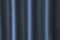 Blue fabric texture surface curtain wave with a pattern background. macro texture of blue striped fabric