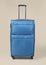 Blue fabric trolley suitcase