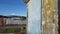 Blue farm door with Mt Taranaki in background