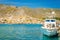 Blue fishermen\'s boat moored in small port, Greece