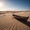 a blue fishing boat in the desert sand.