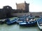 Blue fishing boats in the fishing port of Essaouira, Morocco