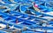 Blue fishing boats with seagull in the foreground in the port of Essaouira, Morocco