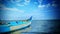 Blue Fishing catamaran in sea shore