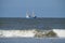 a blue fishing cutter in the picturesque North Sea in Germany