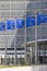 Blue flags of Europe in front of Berlaymont, seat of the European Commission, Brussels, Belgium