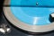 Blue flexi disc in old record player