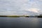 A blue floating house on the banks of the Dnieper River. Landscape.