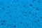 Blue foam sponge background.