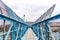 Blue footbridge over railroad