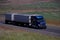 Blue Freightliner / Double Grain Trailers