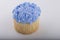 Blue Frosted Vanilla Cupcake with edible pearl decorations