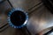 A blue gas flame is seen from the top coming from a household gas burner of a kitchen stove the top Due to Russia`s invasion of