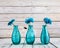 Blue gerbera flower in a vase on wooden background