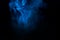 Blue ghostly fog bewitching cigarette vapor on a dark background object for design