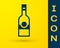 Blue Glass bottle of vodka icon isolated on yellow background. Vector