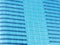 Blue glass wall of skyscraper, abstract background.