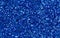 Blue glitter closeup photo. Sparkling glimmer festive backgrop.