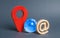 Blue globe planet earth, email symbol and red location indicator. The concept of a global communication system and the Internet