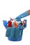Blue Gloved Hand Holding Cleaning Supplies