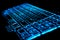 Blue glowing computer laptop keyboard