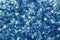 Blue glowing mica glitter abstract background classic color year 2020.