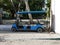 Blue Golf cart on a sandy beach in Maldives