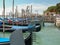Blue gondoles in gondola pier in Venice, Italy, Europe .