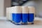 Blue gradation nail polish design bottles