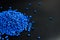 Blue granules of polypropylene, polyamide. Background. Plastic and polymer industry. Microplastic products.