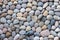 Blue and gray sea pebble stone wall background