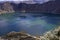 Blue green lake in Quilotoa Volcano