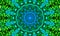 Blue and green mandala with luminous details