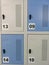 Blue and grey metal cabinet with numbers - vertical